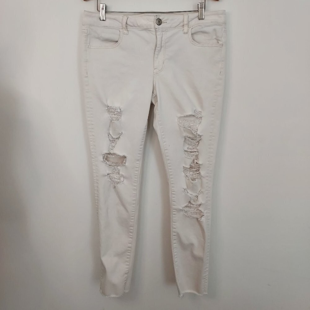 American Eagle Mid Rise Super Distressed Cream Jeggings